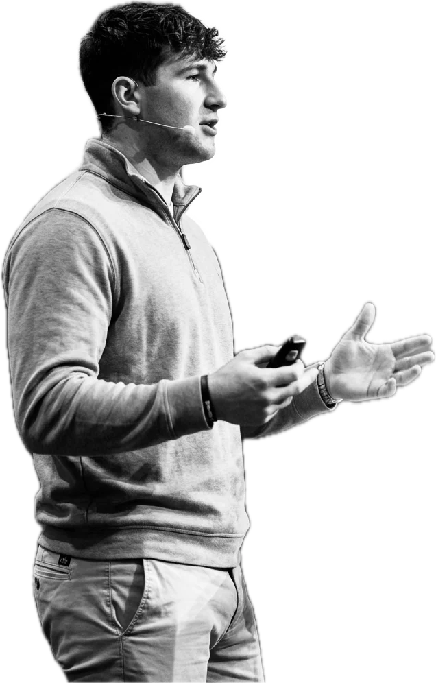 Charlie McConnell speaking on stage